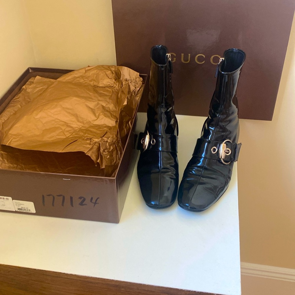 Gucci black patent leather silver buckle boots.